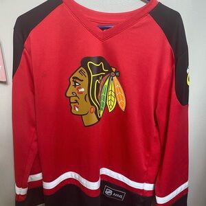 NHL Red and Black V-Neck Sweater with Team Emblem
